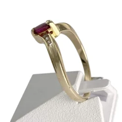Bague d'occasion or 750 jaune rubis diamants