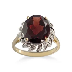 Bague d'occasion 2 ors 750 grenat diamants