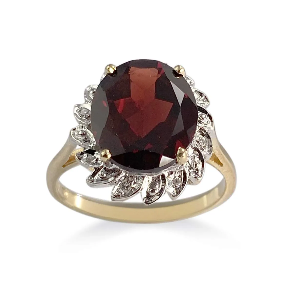 Bague d'occasion 2 ors 750 grenat diamants