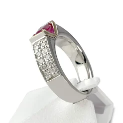 BAGUE d'occasion 2 ors 750 rubis diamants