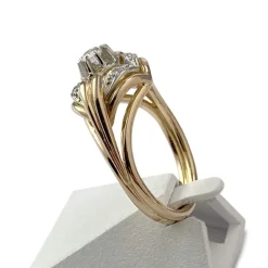 Bague d'occasion 2 ors 750 saphirs synthétiques blancs