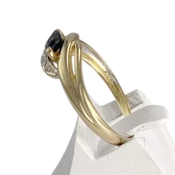 Bague d'occasion  or 750 2 tons diamants et saphir