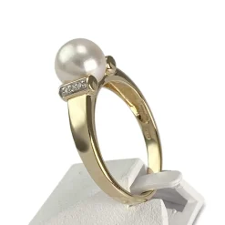 Bague d'occasion  or 750 2 tons diamant perle de culture