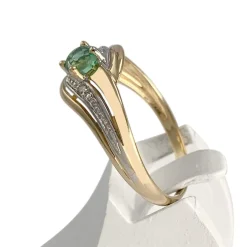 Bague d'occasion  or 2 tons 750 émeraude diamant