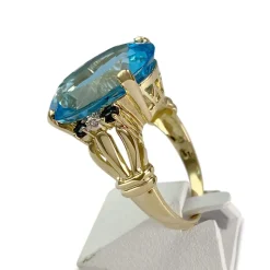 Bague d'occasion or 750 2 tons topaze traitée Swiss blue saphirs diamants