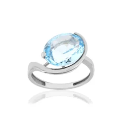 Bague or blanc 750, 1 topaze bleue traitée de 5,25 carats.