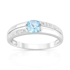 Bague or 375 blanc topaze bleue traitée et diamants