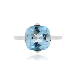 Bague or blanc 750, 1 topaze bleue traitée 5 carats.