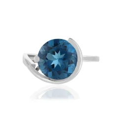 Bague or blanc 750, 1 topaze London Blue traitée de 5 carats.