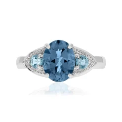 Bague or 375 blanc topazes bleues traitées