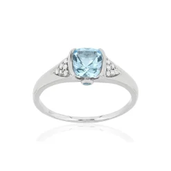 Bague or blanc 375, topazes bleue traitées et diamants.