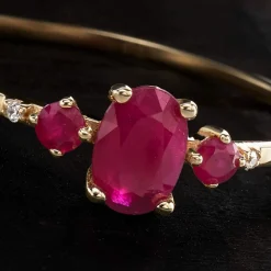 Bague or 375 jaune rubis et diamants