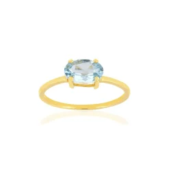 Bague or jaune 375 topaze bleue traitée ovale