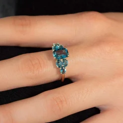 Bague or 375 jaune topazes bleues traitées ovales