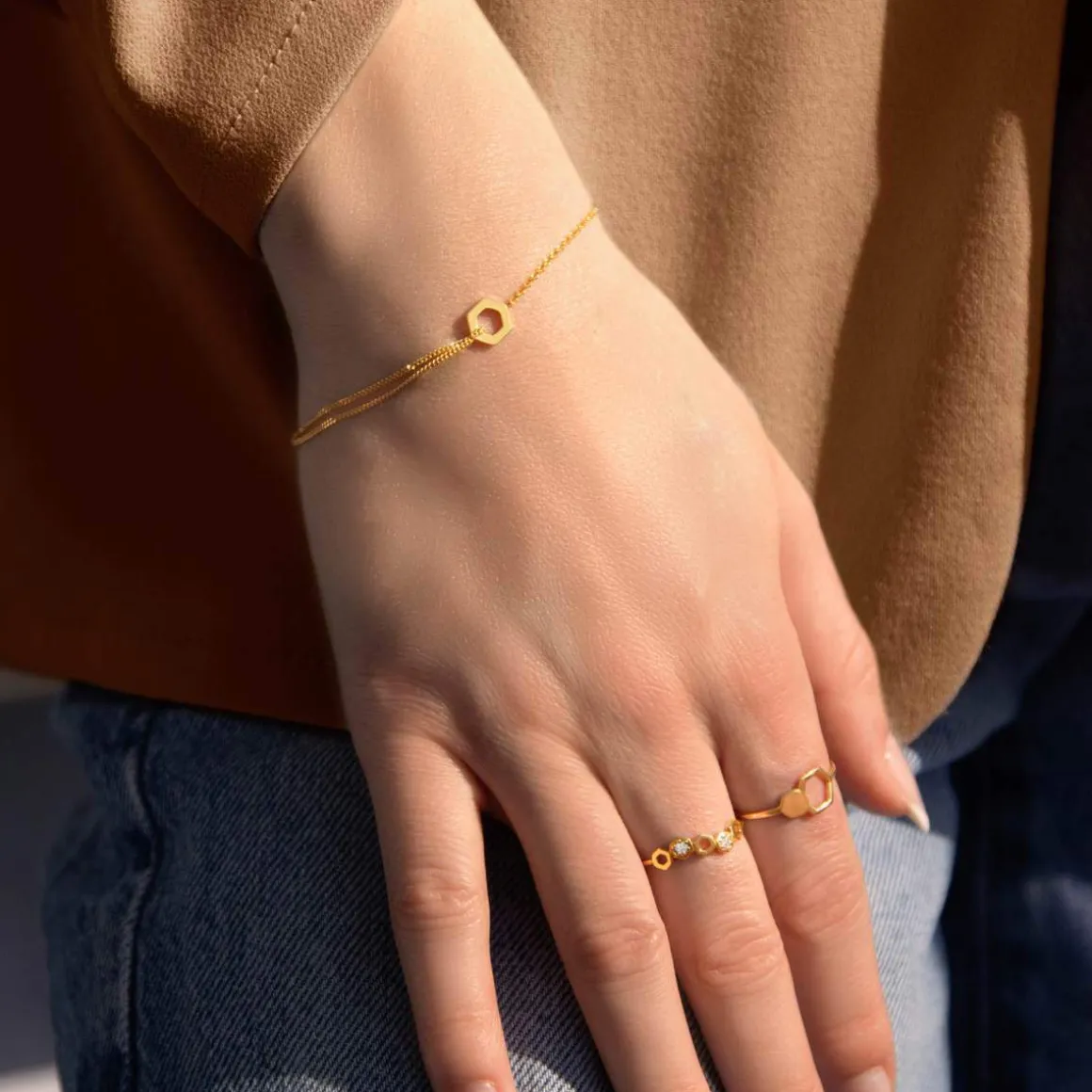 Bague or 375 jaune zirconias motif nids d'abeilles