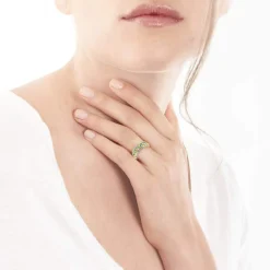 Bague or 750 2 tons émeraudes taille marquise et diamants