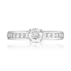 Bague solitaire or 750 blanc diamant 60/100e de carat