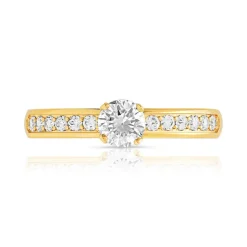 Bague solitaire or 750 jaune diamant 60/100e de carat
