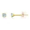 Boucles d'oreilles or 375 jaune topazes bleues traitées 0.24 carat