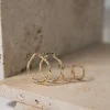 Boucles d'oreilles or 375 jaune zirconias blancs 12 mm