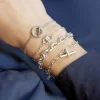 Bracelet argent 925 maille trombone motif T/bar zirconias. Longueur 19 cm.