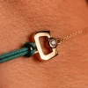 Bracelet boucle chaine or 750 jaune diamant et cordon vert 18cm