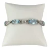 Bracelet d'occasion or 750 blanc maille fantaisie diamants aigues marines 18 cm
