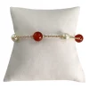 Bracelet d'occasion or 750 jaune maille forcat cornaline perle de culture