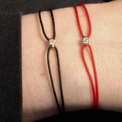 Bracelet or 750 jaune diamant 0.1 carat cordon rouge