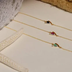 Bracelet or 375 jaune 2 tons rubis et diamant 18cm avec anneau de raccourcissement à 16cm