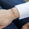 Bracelet plaqué or jaune pierre synthétique rouge
