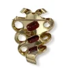 Broche d'occasion or 750 grenats