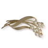Broche d'occasion or 750 jaune perles de culture