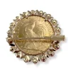 Broche d'occasion or 750 jaune porte pièce rubis synthétiques