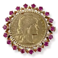 Broche d'occasion or 750 jaune porte pièce rubis synthétiques