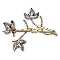 Broche d'occasion 2 ors 750 fleurs diamants