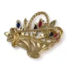 Broche d'occasion  or 2 tons 750 diamants saphirs rubis émeraudes