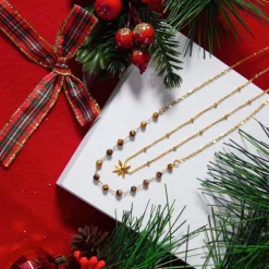 Collier acier doré 2 rangs étoile et pierres oeil de tigre 45 cm