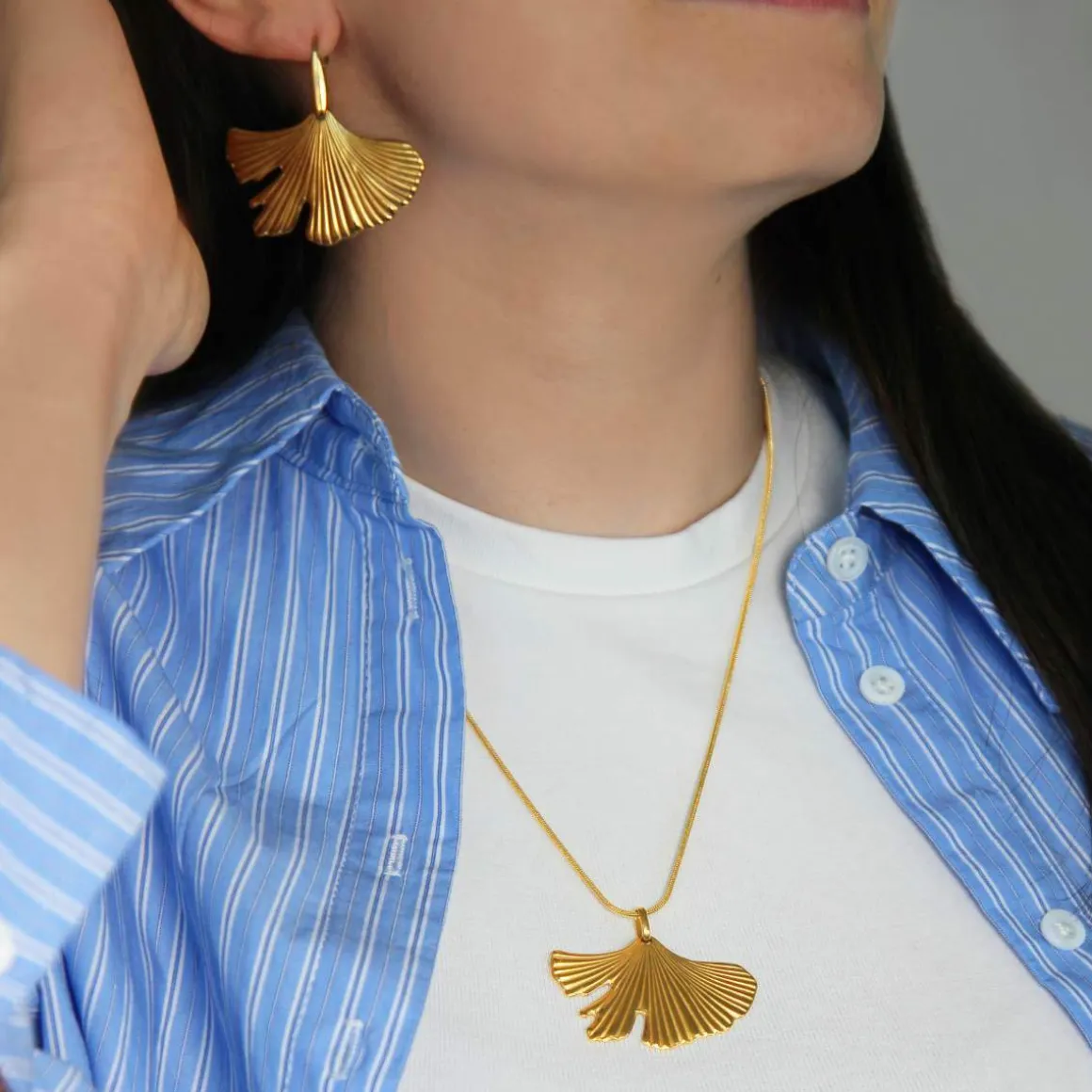 Collier acier jaune motif fleur 55cm