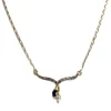 Collier d'occasion en or jaune 750, maille cheval et alternée, saphir et zirconia, 42.5 cm