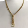 Collier d'occasion en or jaune 750, maille boule, 45 cm