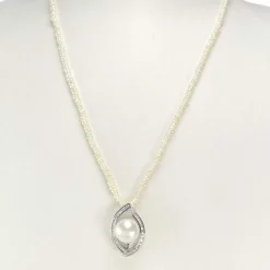 Collier d'occasion or 750 blanc perle de culture perles keshi diamants 45 cm