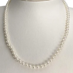 Collier d'occasion or 750 jaune chocker perle de culture de chine
