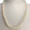 Collier d'occasion or 750 jaune perle de culture d'Akoya