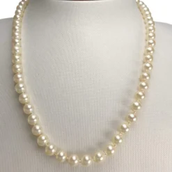 Collier d'occasion or 750 jaune perle de culture d'Akoya