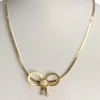 Collier d'occasion or 750 jaune perle de culture