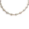 Collier d'occasion or 750 jaune perles de culture de chine 40 cm.