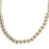 Collier d'occasion or 750 jaune perle de culture du japon