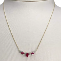 Collier d'occasion  or 750 2 tons maille forçat rubis diamants