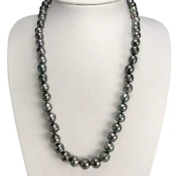 Collier en chute d'occasion or 750 jaune perles de tahiti 60 cm.